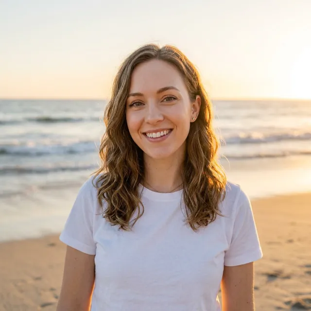 The woman on a beach at sunset